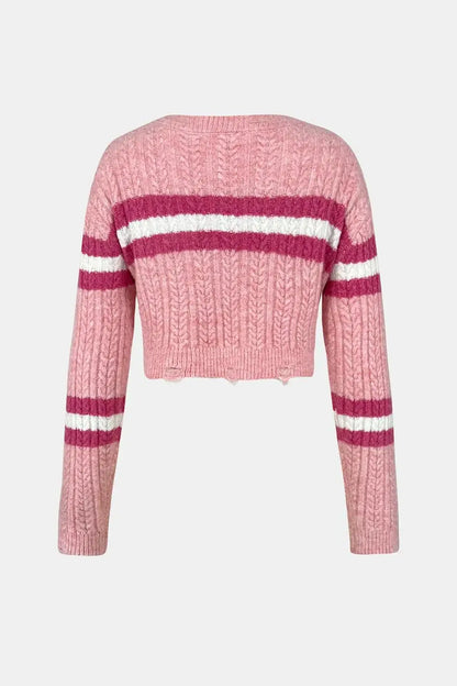 Back view of Cable-Knit Striped Dropped Shoulder Sweater in pink with white stripes, showcasing its cropped design and knitting texture.