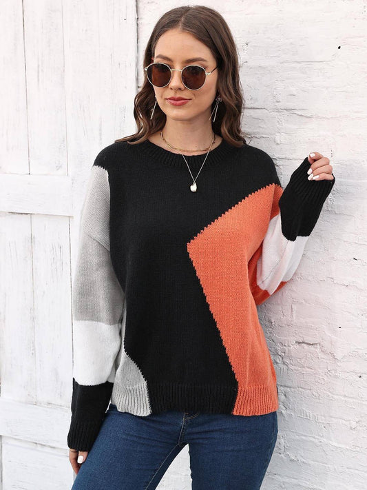 Color Block Round Neck Sweater with a modern design featuring black, orange, gray, and white color blocks.