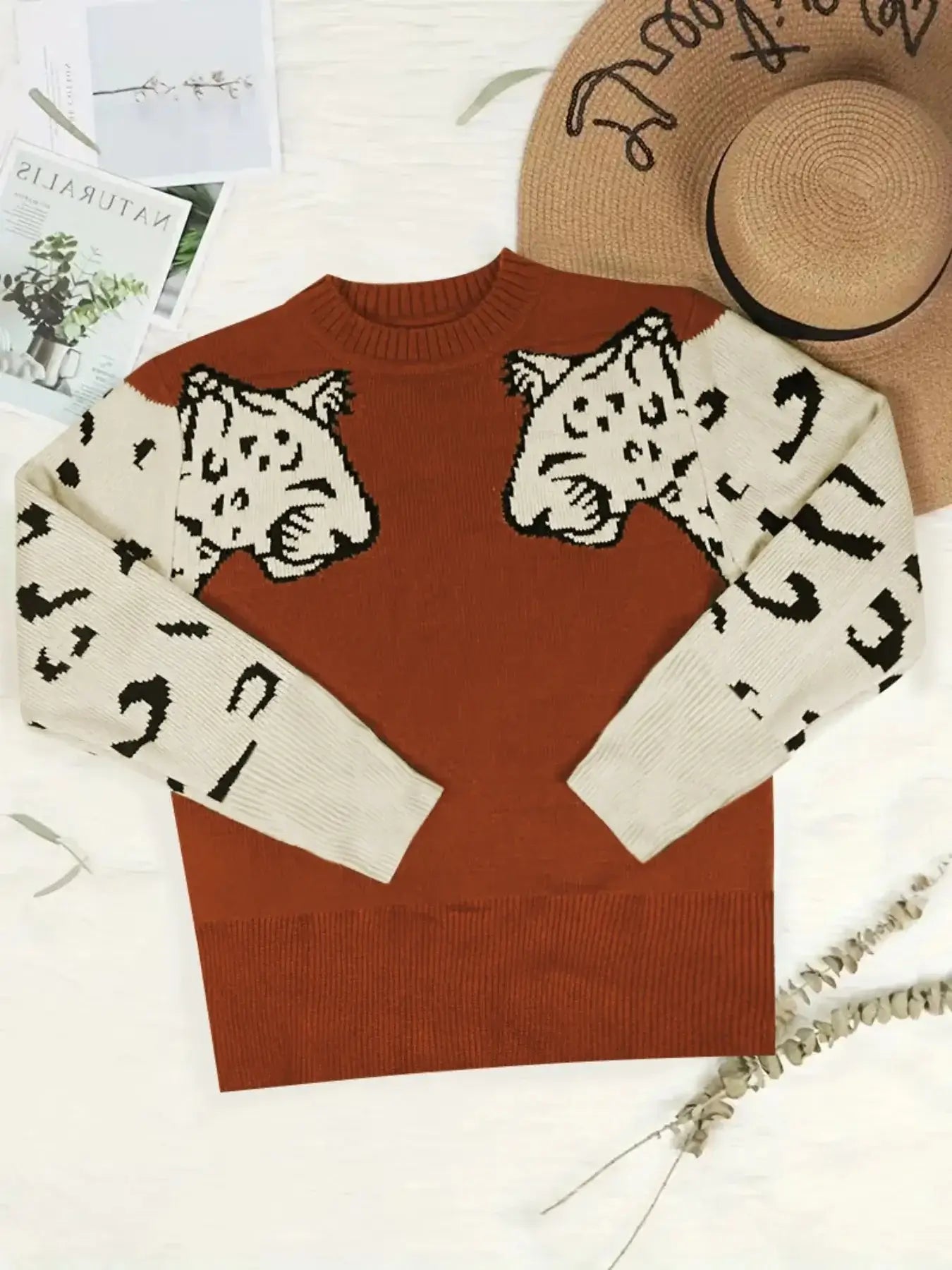 Leopard Print Crew Neck Sweater featuring trendy leopard design, comfortable fit, and classic round neckline, perfect for stylish outfits.